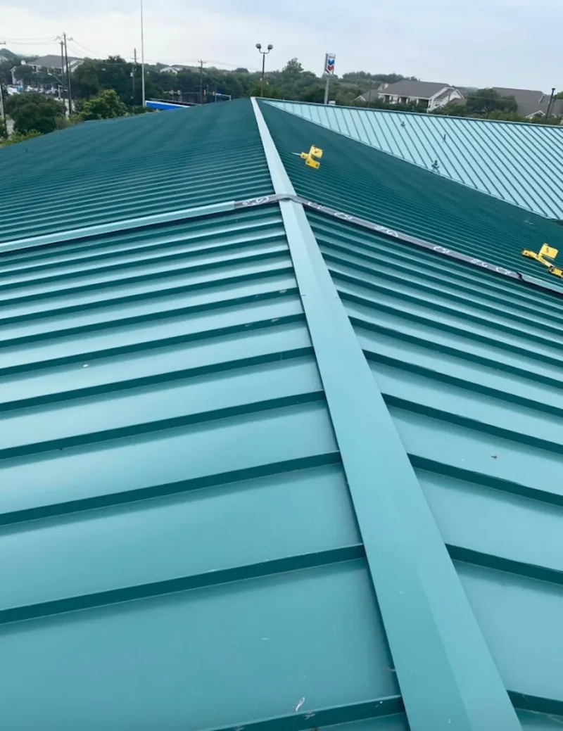 Green commercial metal roof ridge and valley for Metal Roof Repair in Laguna Woods